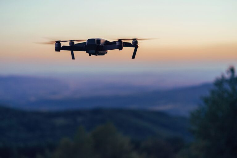 Unmanned aerial vehicle (drone) flying outdoors